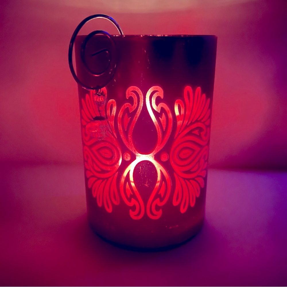 Decorative metallic pink candle holder